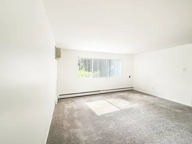 a view of a room with windows