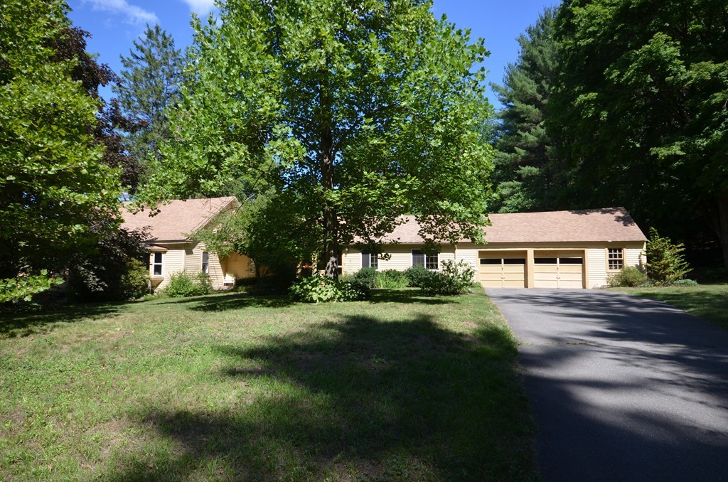712 Pratt Corner Road Shutesbury, MA 01002 - Photo 1 of 30 a view of a house with a yard