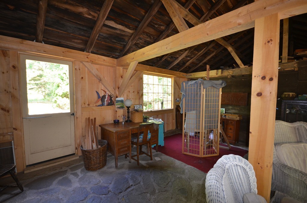 712 Pratt Corner Road Shutesbury, MA 01002 - Photo 22 of 30 a work room with furniture and a window