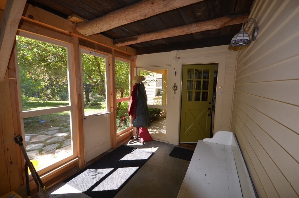 712 Pratt Corner Road Shutesbury, MA 01002 - Photo 26 of 30 a room with two bunk beds and a window