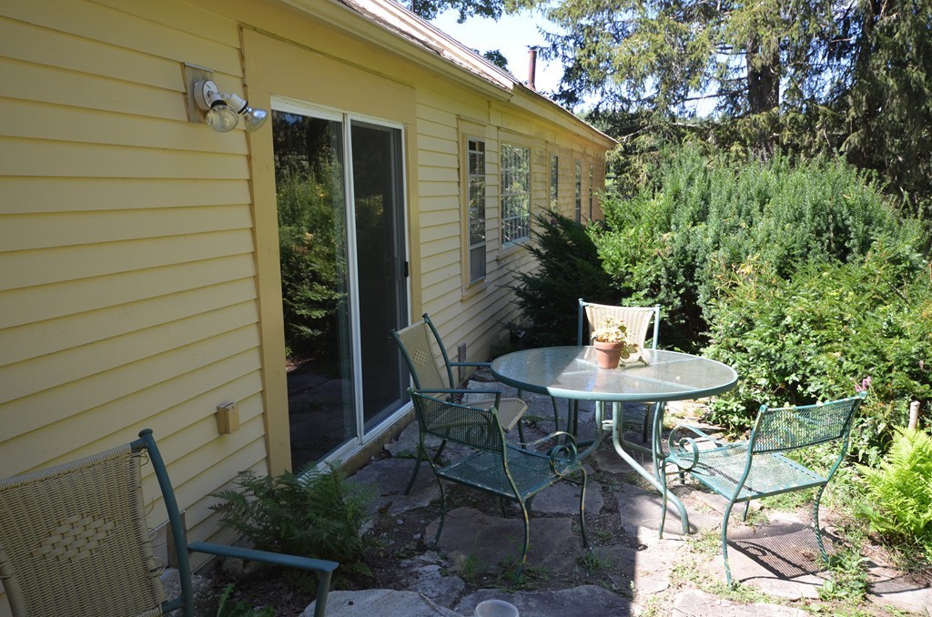 712 Pratt Corner Road Shutesbury, MA 01002 - Photo 29 of 30 a view of a outdoor seating area with furniture