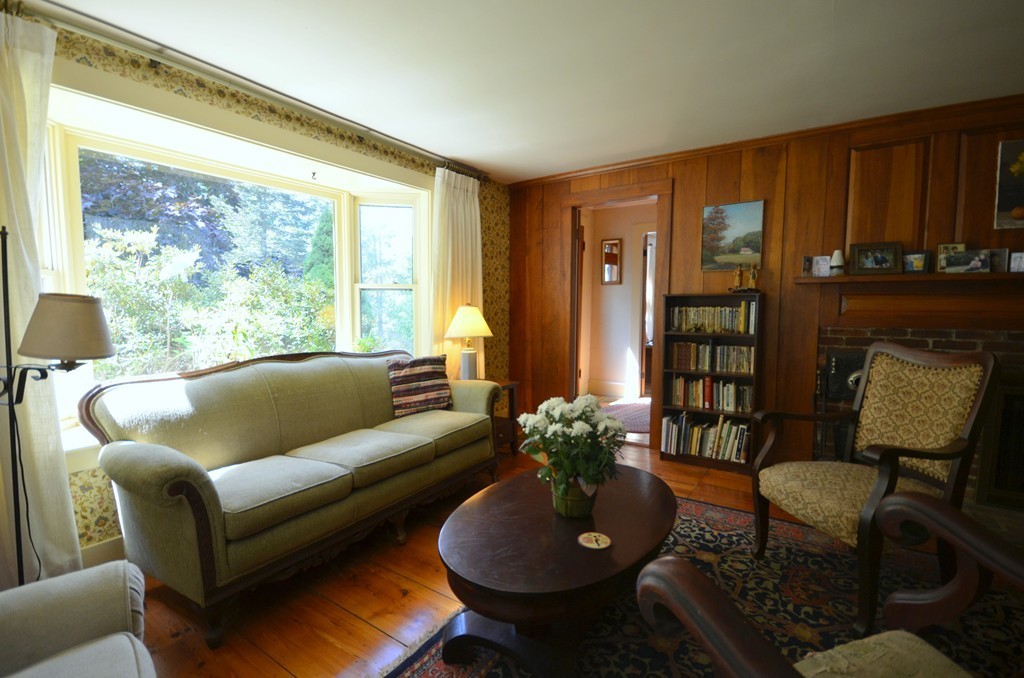 712 Pratt Corner Road Shutesbury, MA 01002 - Photo 3 of 30 a living room with furniture and a potted plant