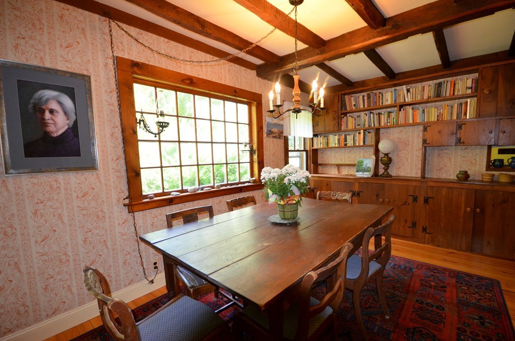 712 Pratt Corner Road Shutesbury, MA 01002 - Photo 5 of 30 a view of a dining room with furniture and window