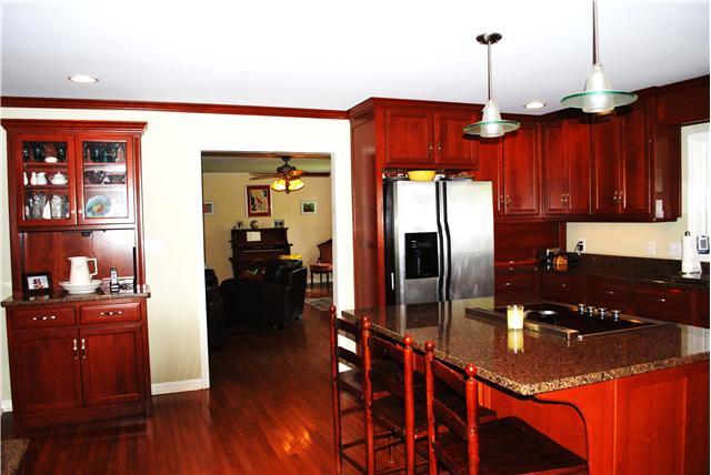 170 Tate Road Sewanee, TN 37375 - Photo 6 of 20 Kitchen looking toward living room. Large granite topped island for the family to eat, food prep area or entertaining