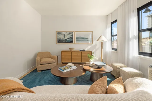 a living room with furniture and window