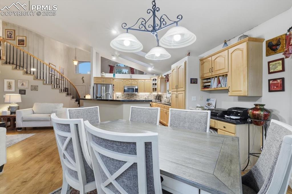 15655 Falcon Ridge Court Colorado Springs, CO 80921 - Photo 11 of 49 Informal dining area with walk-out onto patio