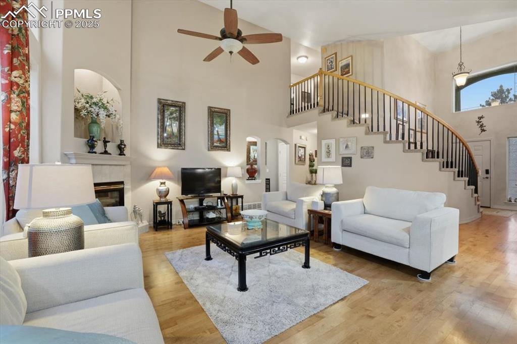 15655 Falcon Ridge Court Colorado Springs, CO 80921 - Photo 13 of 49 Beautiful open living room with walkout onto deck and tons of natural light!