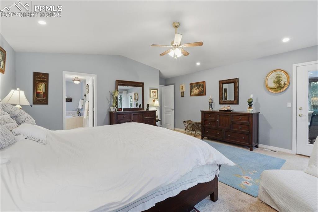 15655 Falcon Ridge Court Colorado Springs, CO 80921 - Photo 17 of 49 Main level master with en-suite 5 piece bathroom, and walkout on to deck!