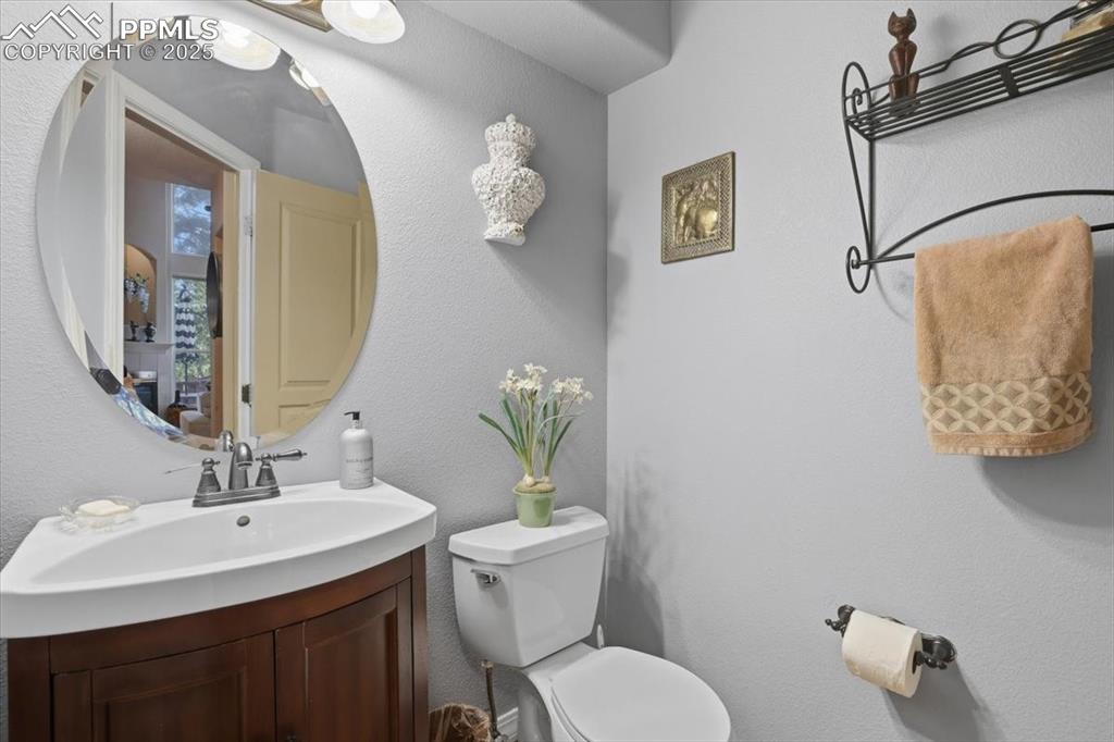 15655 Falcon Ridge Court Colorado Springs, CO 80921 - Photo 20 of 49 Main floor half bath off of garage entrance