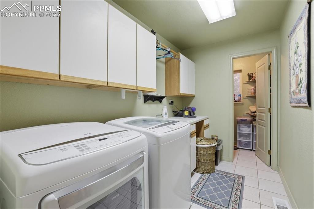 15655 Falcon Ridge Court Colorado Springs, CO 80921 - Photo 21 of 49 Main floor laundry