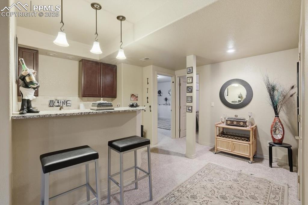 15655 Falcon Ridge Court Colorado Springs, CO 80921 - Photo 27 of 49 Basement wine bar
