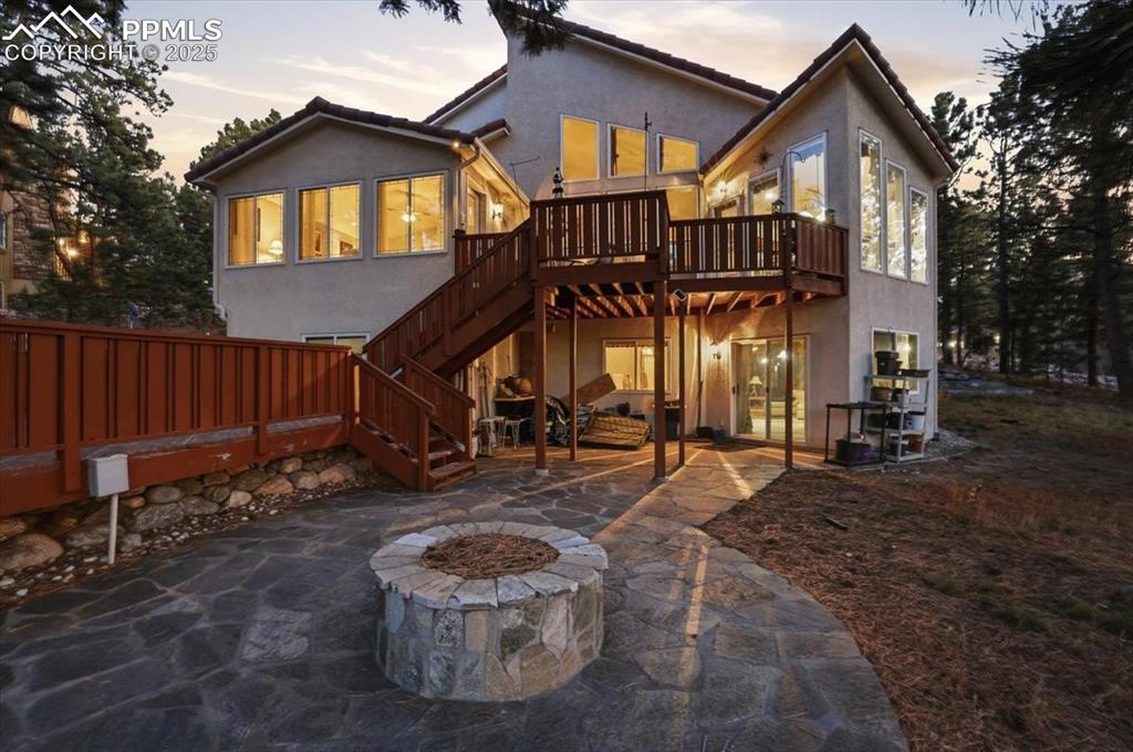 15655 Falcon Ridge Court Colorado Springs, CO 80921 - Photo 43 of 49 Firepit off of lower patio