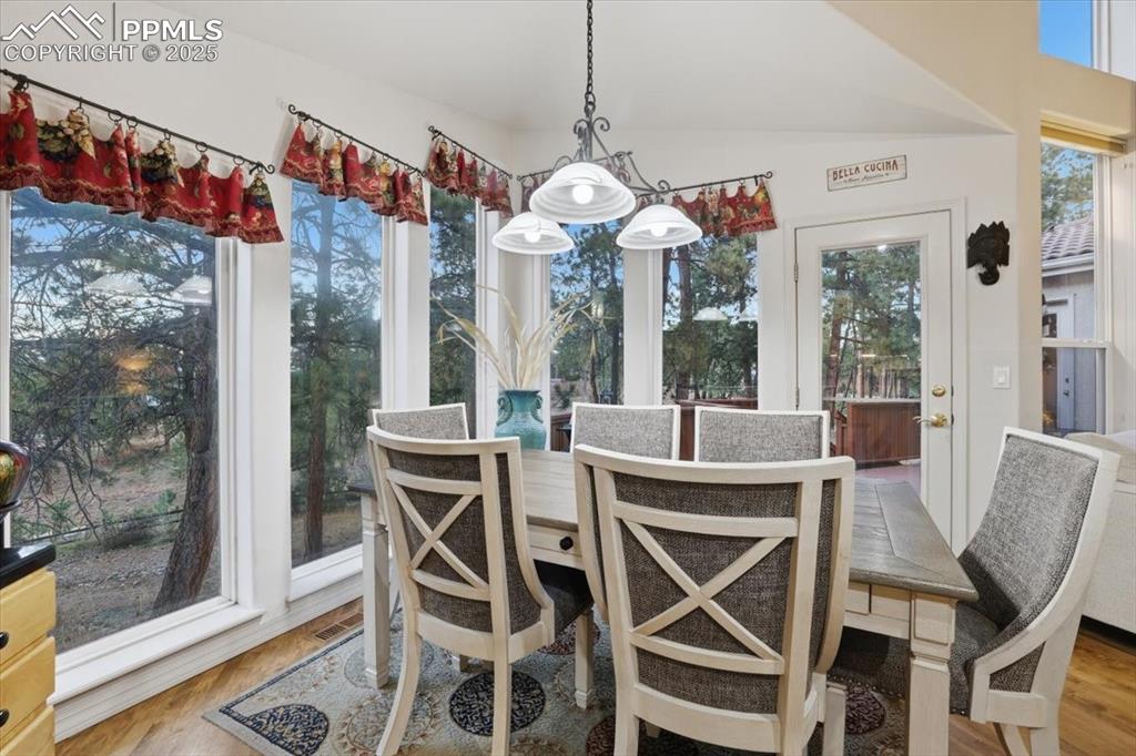 15655 Falcon Ridge Court Colorado Springs, CO 80921 - Photo 10 of 49 Informal dining area with walk-out onto patio
