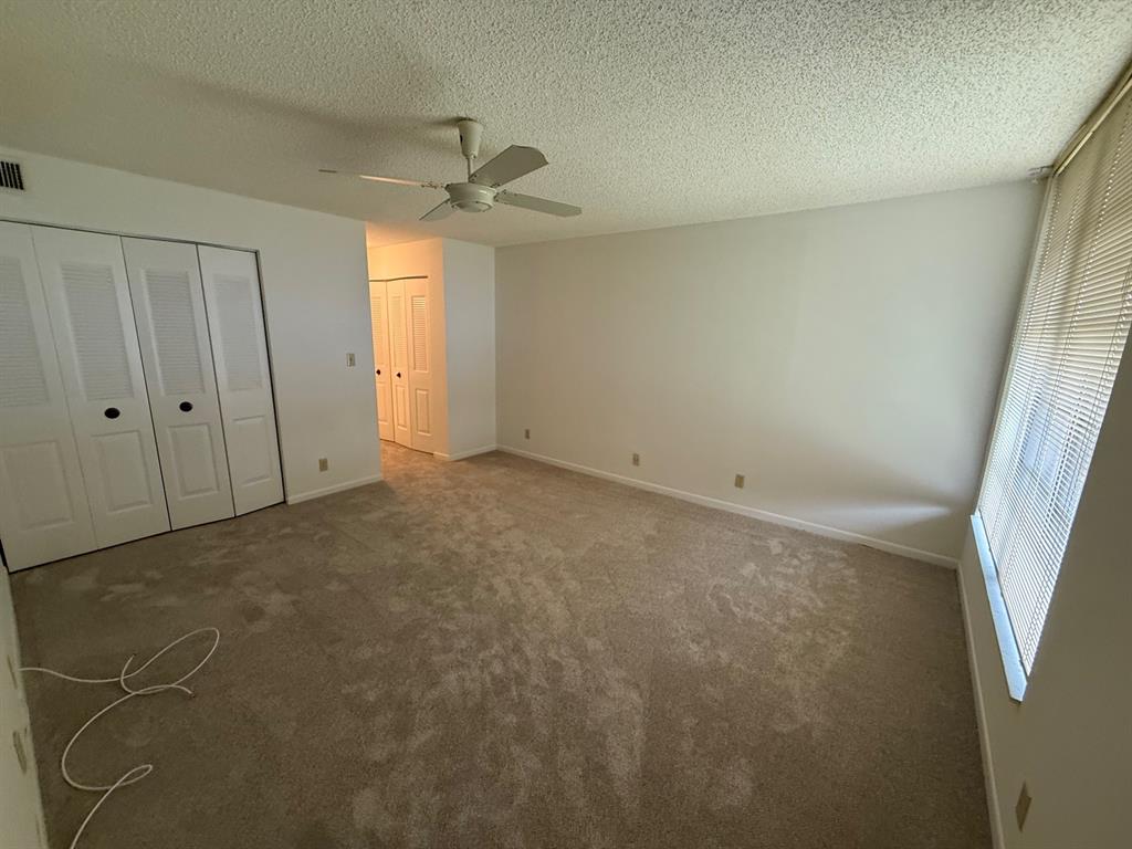6215 Coral Lake Drive, Unit 203 Margate, FL 33063 - Photo 13 of 46 an empty room with a window