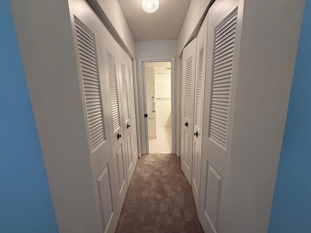 6215 Coral Lake Drive, Unit 203 Margate, FL 33063 - Photo 16 of 46 a view of a hallway with a hallway