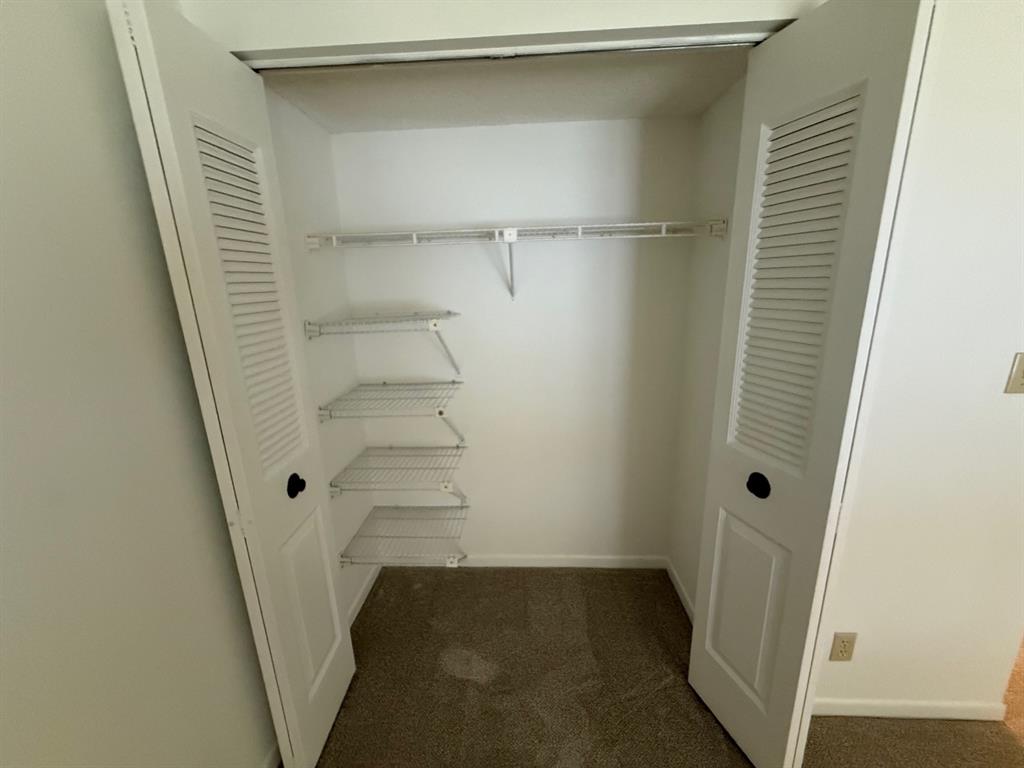 6215 Coral Lake Drive, Unit 203 Margate, FL 33063 - Photo 22 of 46 a view of walk in closet