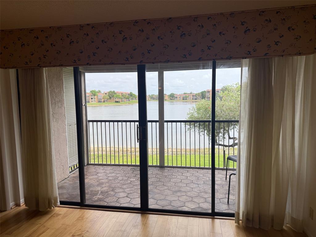 6215 Coral Lake Drive, Unit 203 Margate, FL 33063 - Photo 24 of 46 a view of a porch