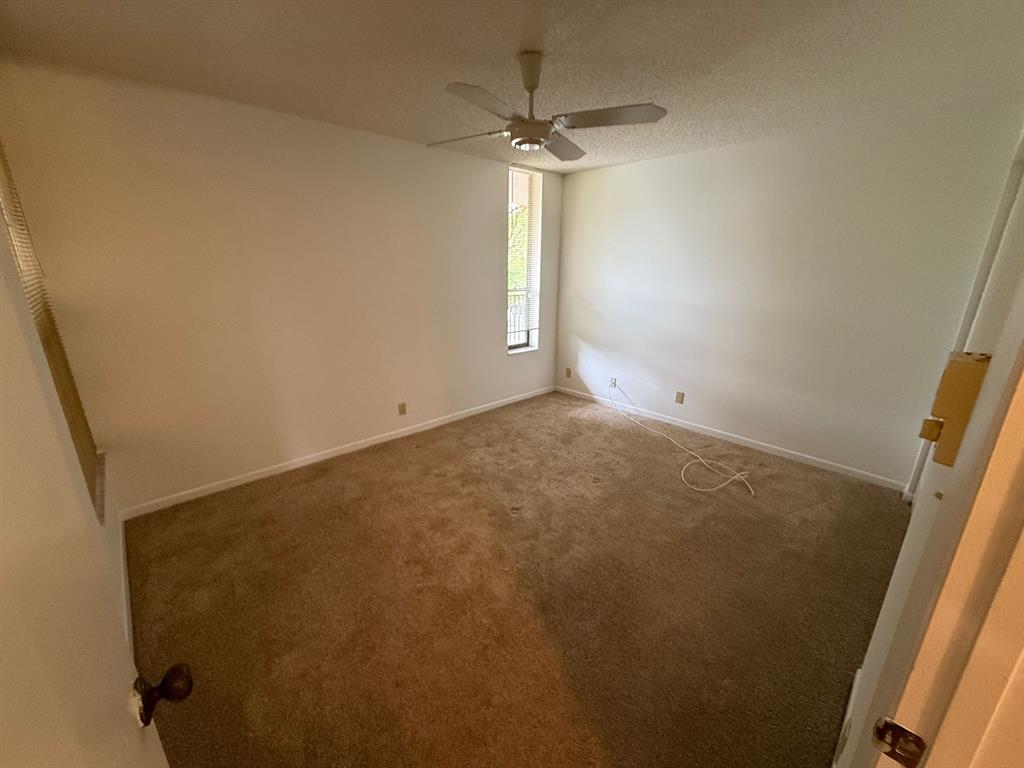 6215 Coral Lake Drive, Unit 203 Margate, FL 33063 - Photo 27 of 46 an empty room with a window