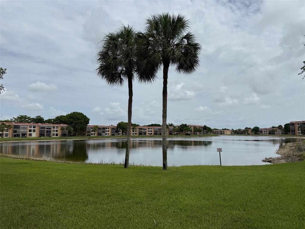 6215 Coral Lake Drive, Unit 203 Margate, FL 33063 - Photo 37 of 46 a view of a lake with a city view
