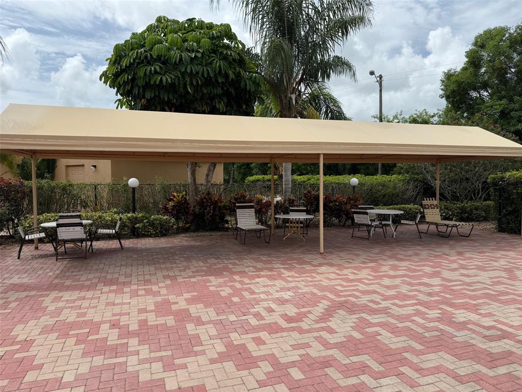 6215 Coral Lake Drive, Unit 203 Margate, FL 33063 - Photo 41 of 46 a view of outdoor space yard and porch