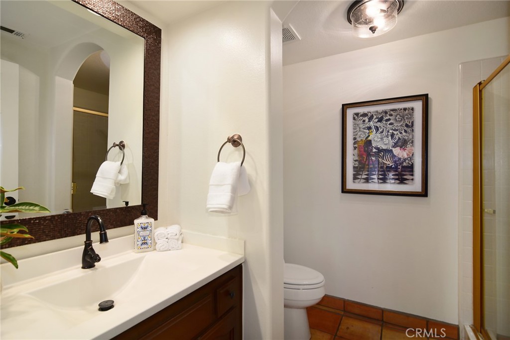 951 Firestone Circle Simi Valley, CA 93065 - Photo 16 of 41 a bathroom with a sink vanity and a mirror