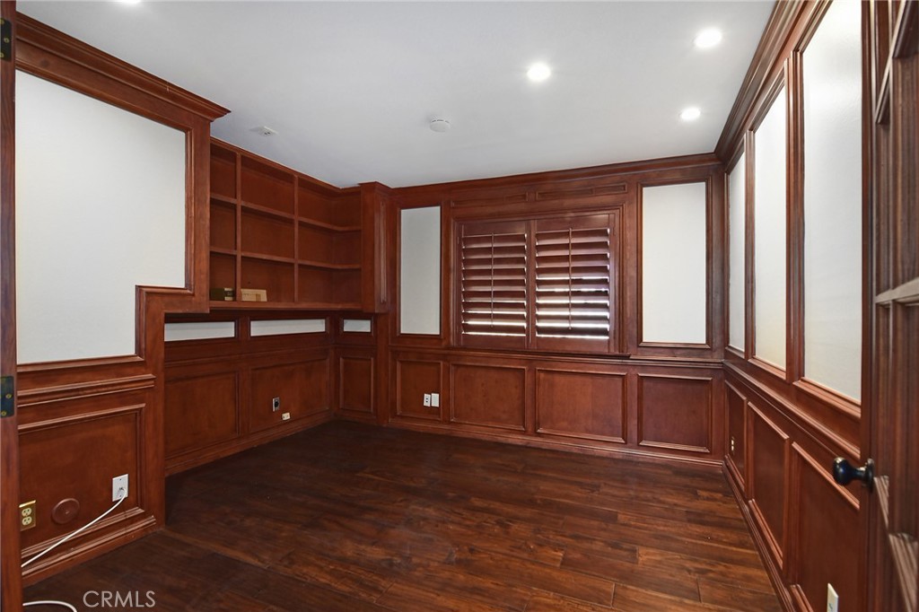 951 Firestone Circle Simi Valley, CA 93065 - Photo 17 of 41 a kitchen with granite countertop a stove and a wooden cabinets
