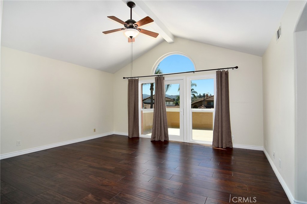 951 Firestone Circle Simi Valley, CA 93065 - Photo 20 of 41 a view of an empty room with wooden floor and a window