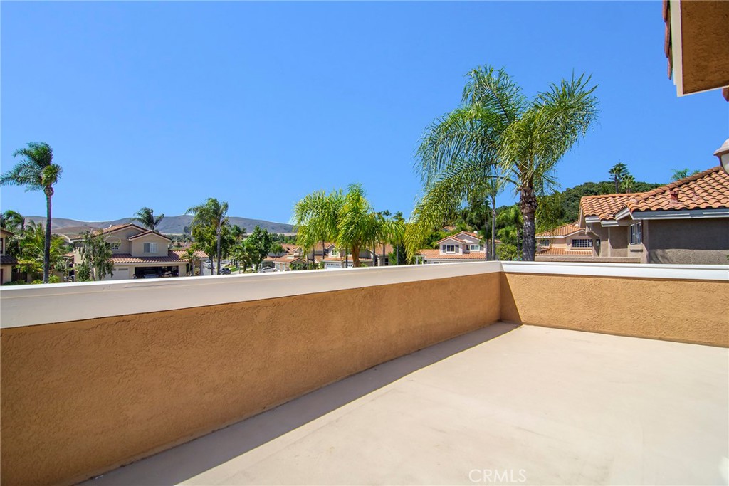 951 Firestone Circle Simi Valley, CA 93065 - Photo 25 of 41 a view of balcony with potted plants