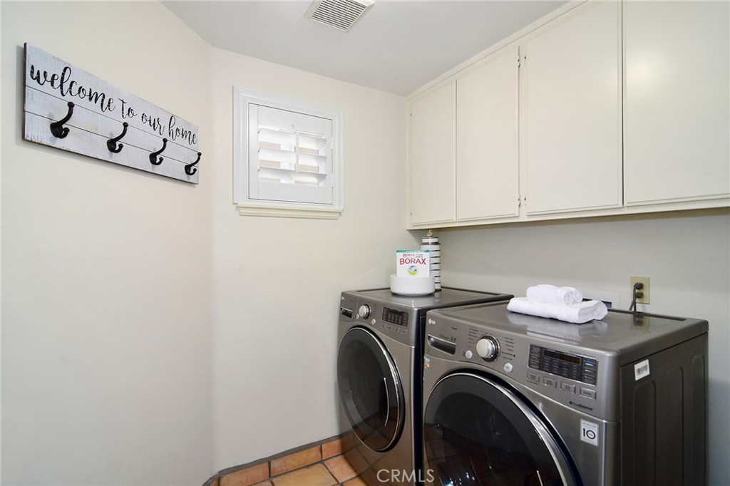 951 Firestone Circle Simi Valley, CA 93065 - Photo 32 of 41 a utility room with dryer and washer