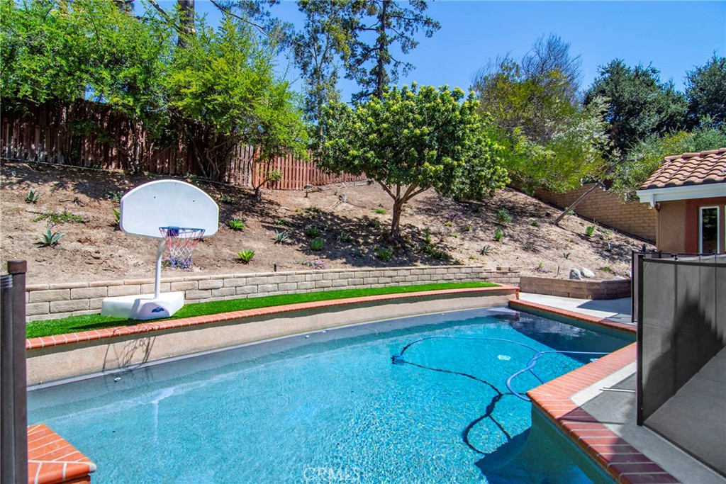 951 Firestone Circle Simi Valley, CA 93065 - Photo 33 of 41 a view of swimming pool with a backyard and slide