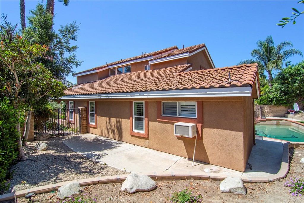 951 Firestone Circle Simi Valley, CA 93065 - Photo 39 of 41 a front view of a house with garden