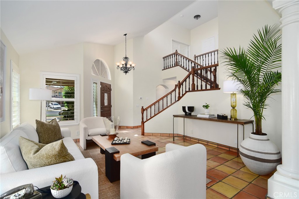 951 Firestone Circle Simi Valley, CA 93065 - Photo 9 of 41 a living room with furniture and a potted plant