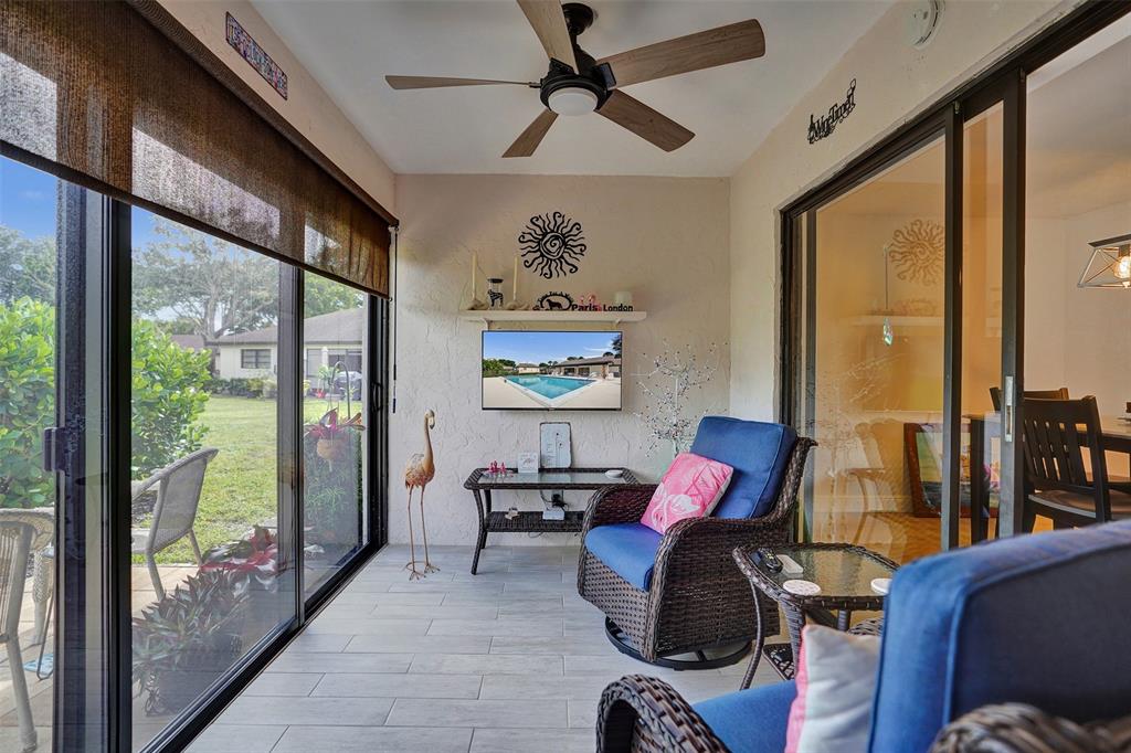 4840 Greentree Lane, Unit B Boynton Beach, FL 33436 - Photo 19 of 68 a workspace with furniture window and outside view