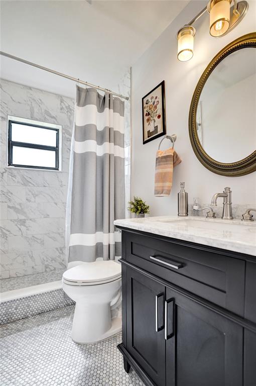 4840 Greentree Lane, Unit B Boynton Beach, FL 33436 - Photo 38 of 68 a bathroom with a sink and a mirror