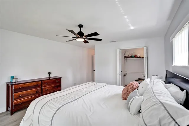 a front view of a house with outdoor seating