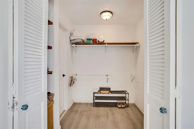 a view of a house with swimming pool and sitting area