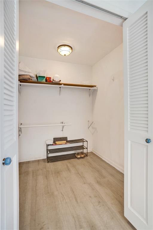 4840 Greentree Lane, Unit B Boynton Beach, FL 33436 - Photo 48 of 68 a view of a room with rack on the wall