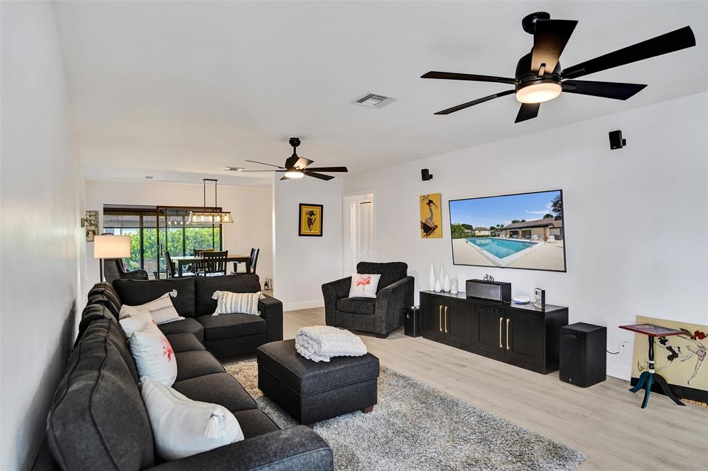 4840 Greentree Lane, Unit B Boynton Beach, FL 33436 - Photo 6 of 68 a living room with furniture and a window