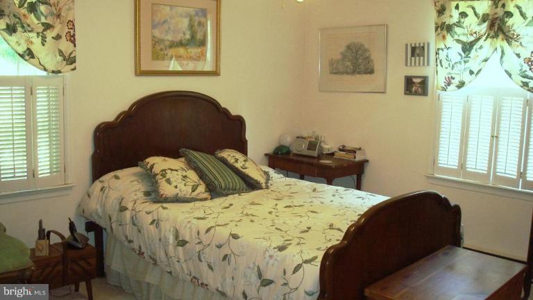 4321 Sangamore Road, Unit 11 Bethesda, MD 20816 - Photo 8 of 11 Master bedroom with ceiling fan.