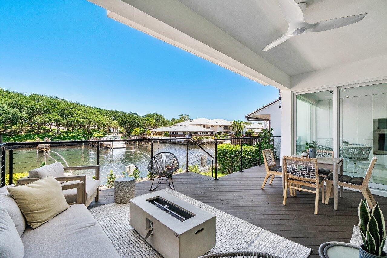 a patio with patio a couch and chairs