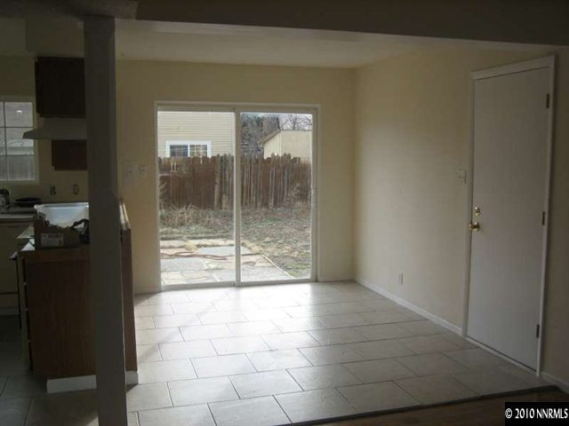 2390 East 9th Street Reno, NV 89512 - Photo 5 of 7 a view of a glass door and the hallway