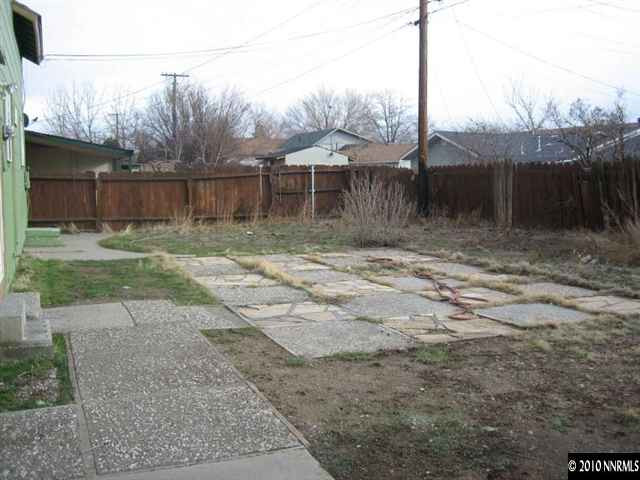 2390 East 9th Street Reno, NV 89512 - Photo 7 of 7 a backyard of a house with lots of green space