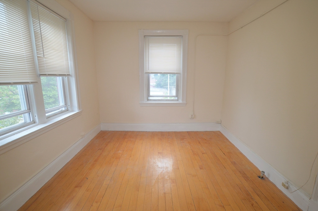 15 Lynde Street, Unit 22 Salem, MA 01970 - Photo 3 of 7 an empty room with a window