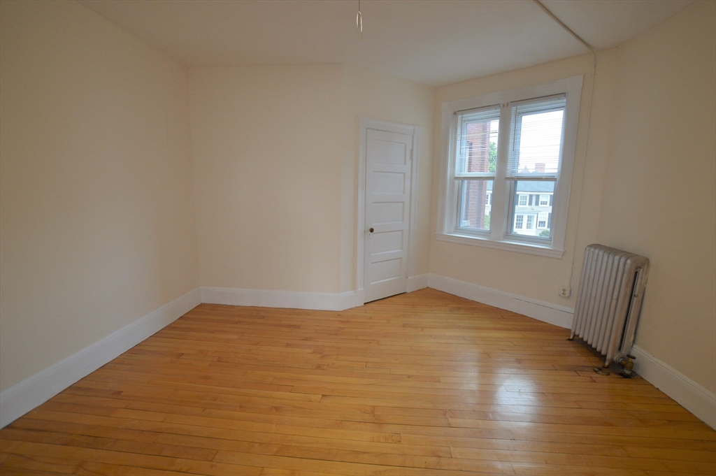 15 Lynde Street, Unit 22 Salem, MA 01970 - Photo 4 of 7 an empty room with windows
