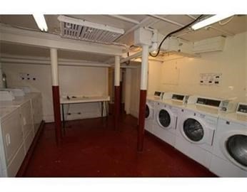 15 Lynde Street, Unit 22 Salem, MA 01970 - Photo 7 of 7 a view of a storage & utility room with washer and dryer