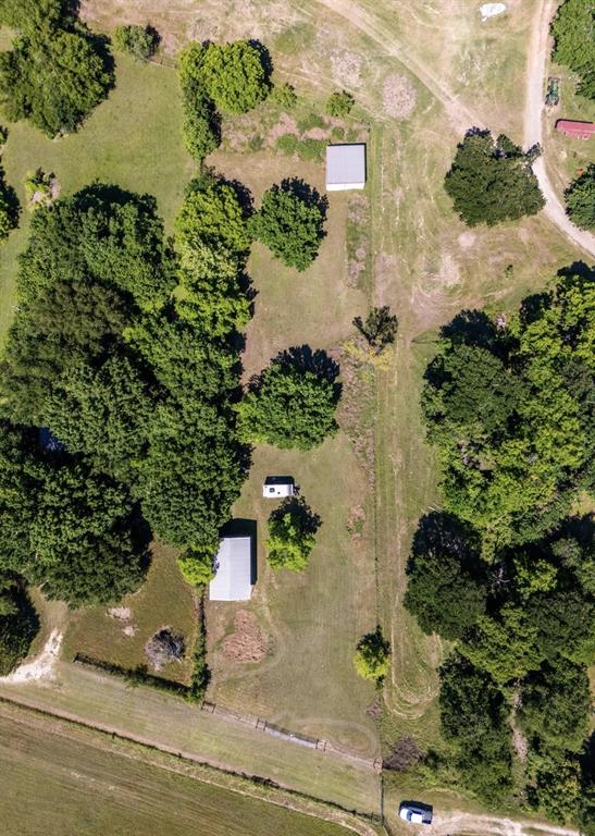163 Fenn Road Blum, TX 76627 - Photo 7 of 8 an aerial view of a house with a yard