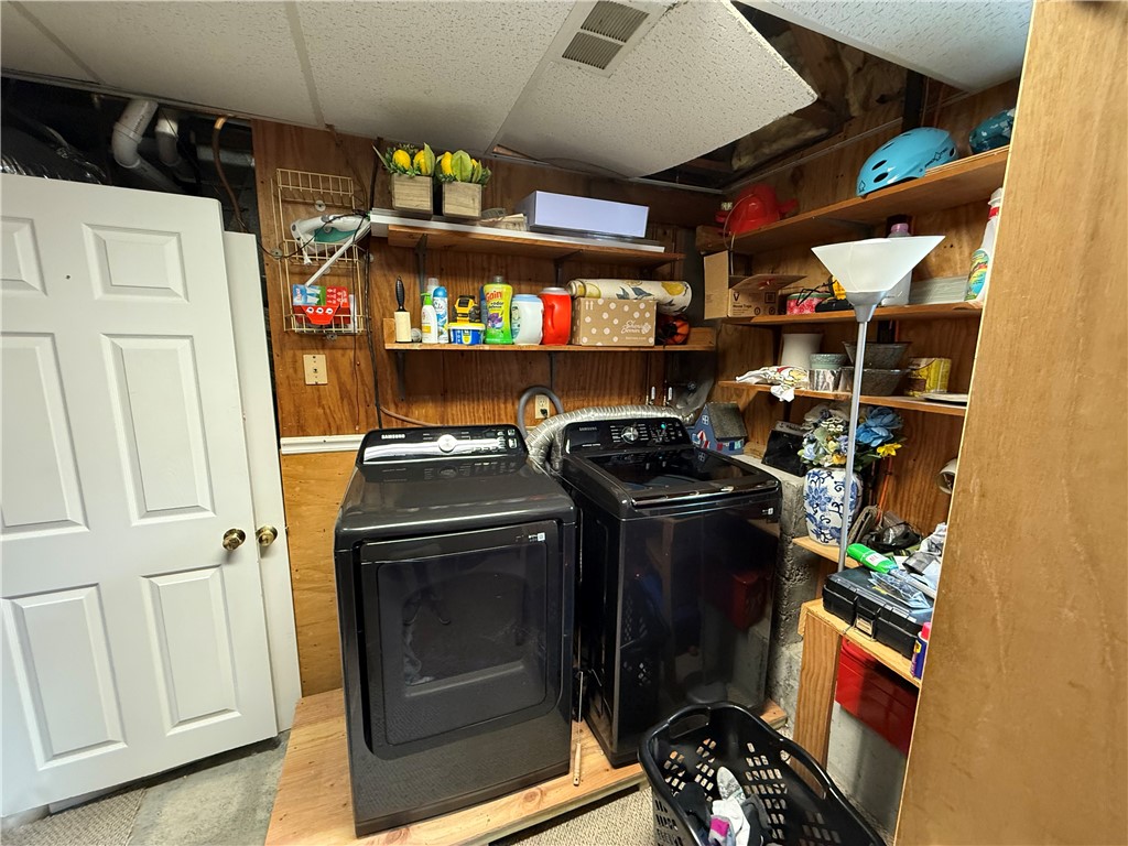 31 Clarke Road Coventry, RI 02816 - Photo 21 of 26 Laundry room with plenty of shelves and storage space