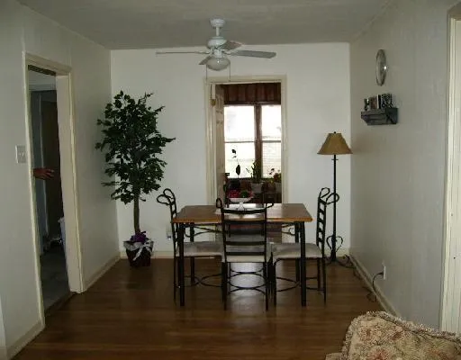 a view of a livingroom with furniture and window