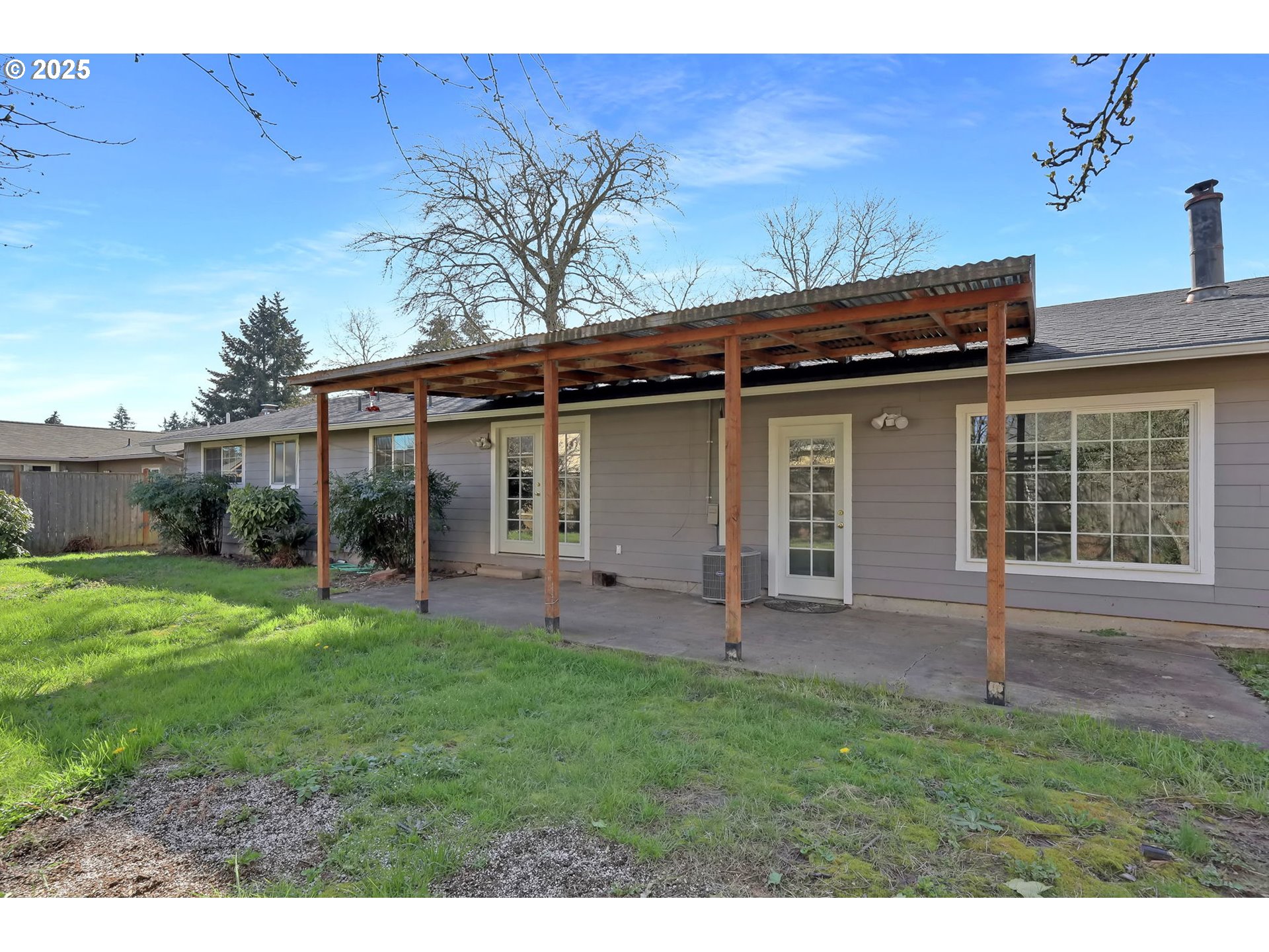 2793 Summer Lane Eugene, OR 97404 - Photo 14 of 15 a view of a house with a yard and sitting area