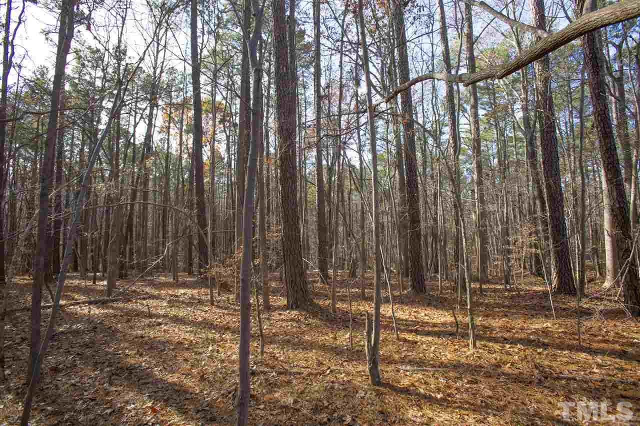 5112 Durham Road Wake Forest, NC 27587 - Photo 13 of 18 a view of outdoor space with wooden fence